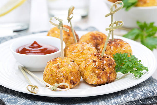 istock chicken meatballs in breading with tomato sauce on the plate 482967655