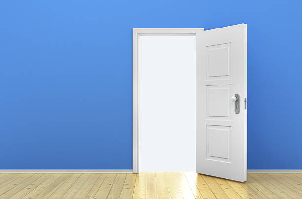 istock Opened door in the empty blue room 482967998