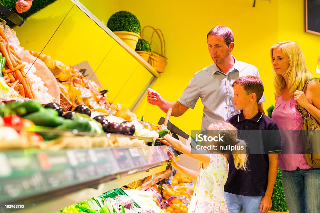 family at the supermarket 40-49 Years Stock Photo