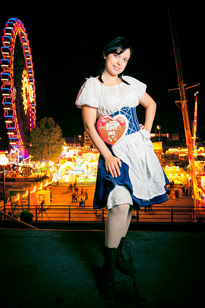 istock young woman at the cannstatter wasen 482969095