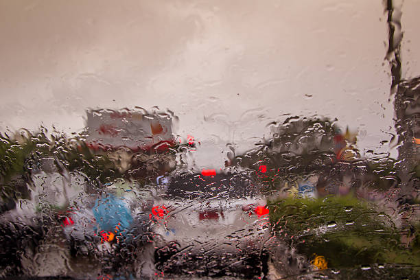 istock blurred image of traffic view through a car windscreen 482969240