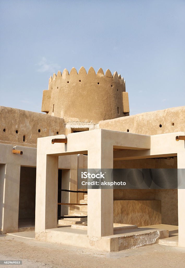 The Northern tower of Zubarah fort, Qatar The Zubarah Fort built in 1938 follows a traditional concept with a square ground plan with towers at the corner 1938 Stock Photo