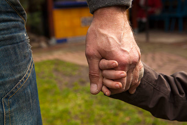 istock Grandfather and grandson for a walk 482970721