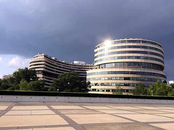 Watergate Complex from Kennedy Center 3 View of Watergate from the Kennedy Center - with approaching storm, and sun glinting off the windows. hotel watergate stock pictures, royalty-free photos & images