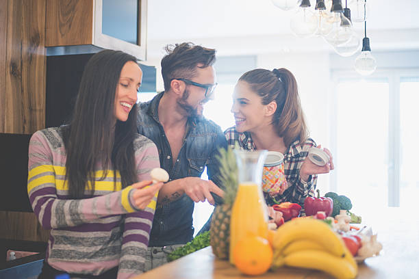 istock People tasting food in the kitchen 482982408