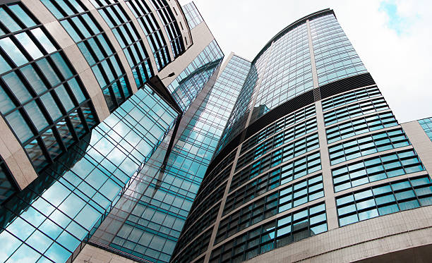 istock High glass office building with clouds. background 482983926