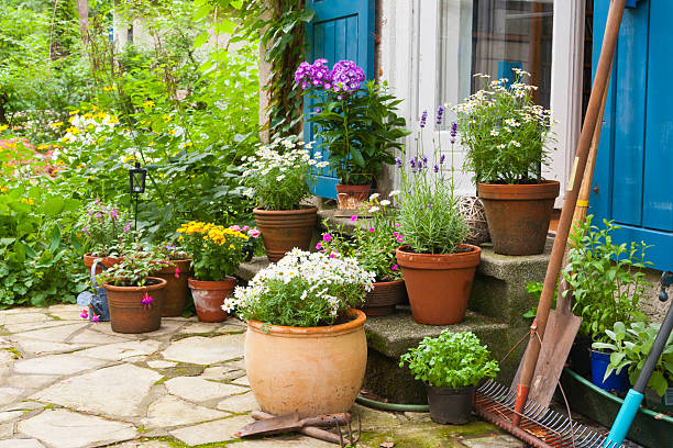 patio patio with flowers and flower pots flower pot stock pictures, royalty-free photos & images