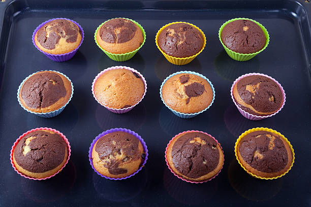 istock Freshly baked muffins on a roasting pan 482987850