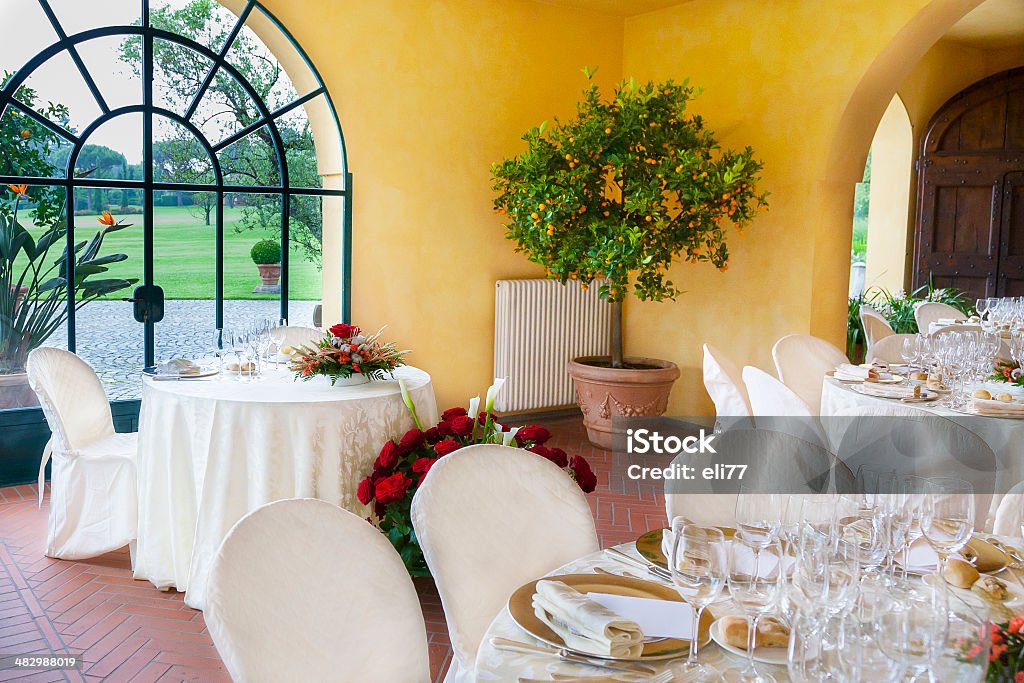 wedding reception tables Tables decorated for a party or wedding reception Arrangement Stock Photo