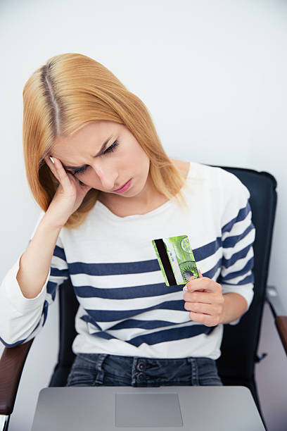 istock Woman holding bank card 482988716
