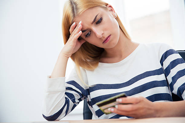 istock Woman holding bank card 482988904