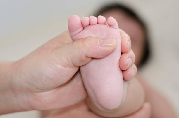 istock Baby foot massage 482991119