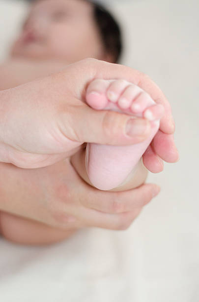 istock Baby foot massage 482991161