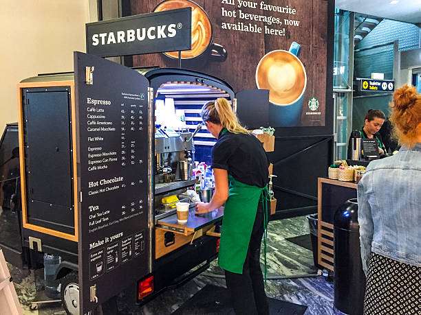 Starbucks mobile kiosk at Oslo Airport, Norway stock photo
