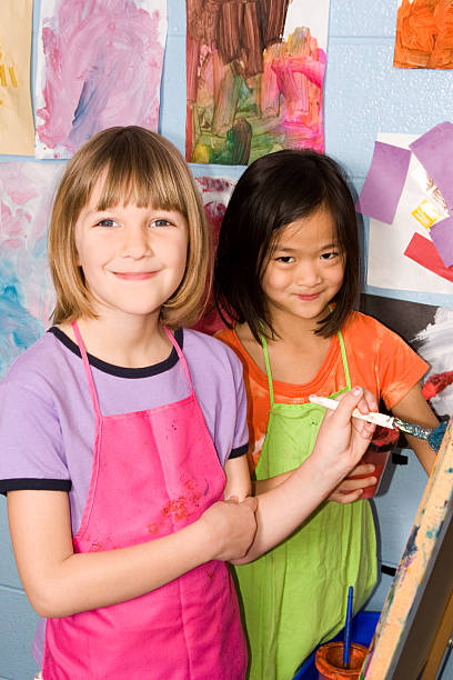 istock Friends painting together in class 482991881