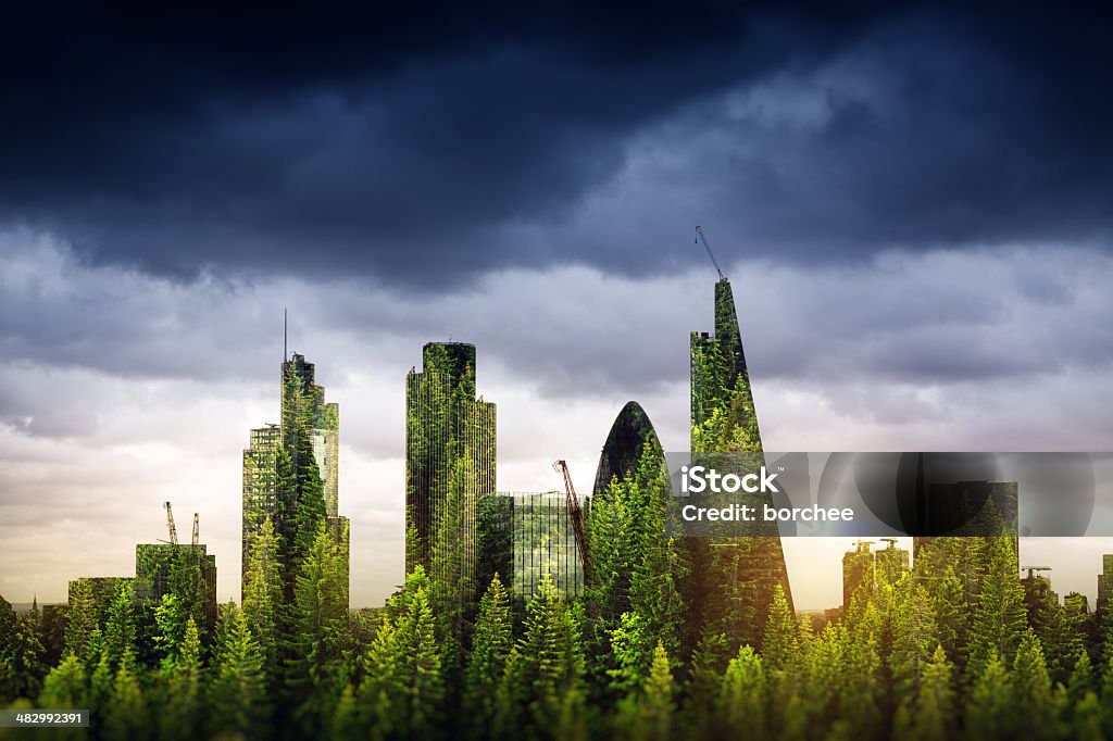 City Of London City of London, one of the leading centres of global finance, covered with forest. Green London /  double exposure. Green Color Stock Photo