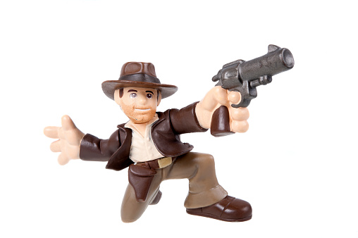 Adelaide, Australia - July 29, 2015: A studio shot of a Indiana Jones action figure from the popular movie series. Merchandise from Marvel comics and movies are highy sought after collectables.