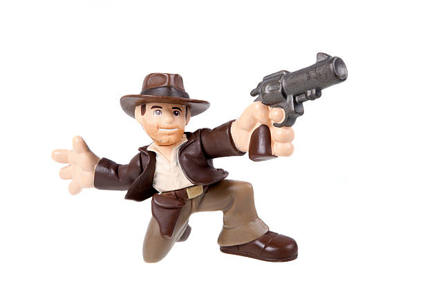 Indiana Jones figure Adelaide, Australia - July 29, 2015: A studio shot of a Indiana Jones action figure from the popular movie series. Merchandise from Marvel comics and movies are highy sought after collectables. action figure photos stock pictures, royalty-free photos & images