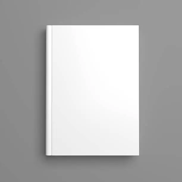 Top view of white blank book cover on grey background with shadow