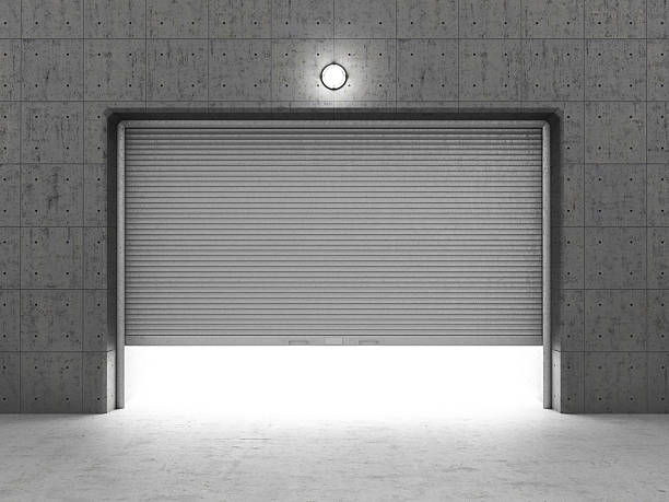 istock Garage building made of concrete with roller shutter doors. 483011062