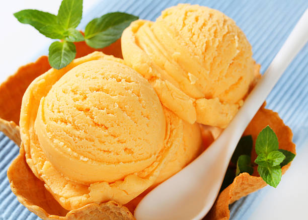 istock Orange sherbet in a waffle basket 483014436