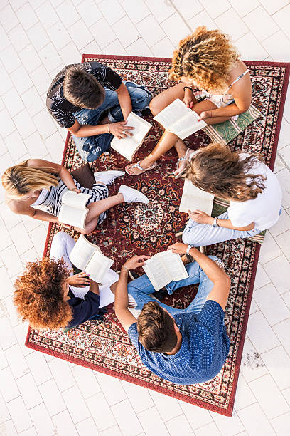 istock Friends have a public reading together 483018322