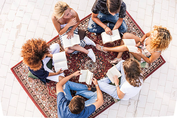 istock Friends have a public reading together 483018324