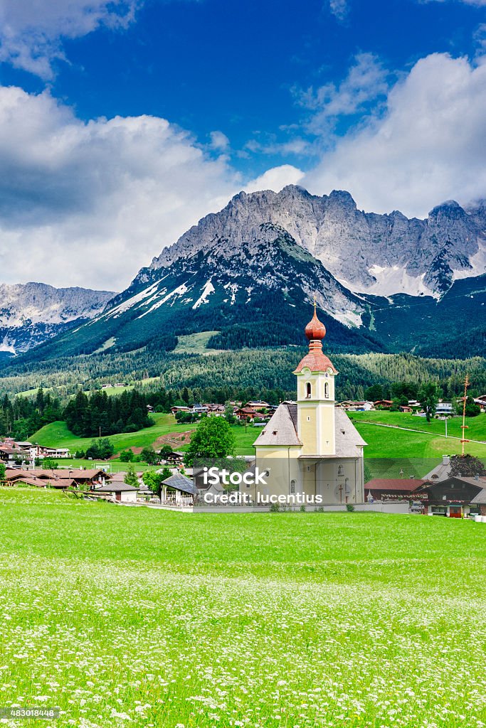 Wilder Kaiser mountain in Austria Austrian village below the Wilder Kaiser mountain in Austrian Tirol. AdobeRGB colorspace. Kaiser Mountains Stock Photo