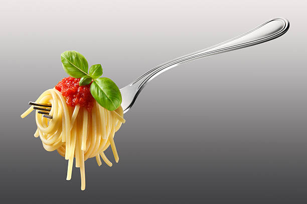 istock Forkful of spaghetti with tomato sauce and basil 483020754