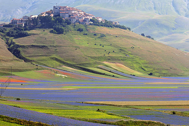 Castelluccio di Norcia (Italy), Village on a green hill stock photo