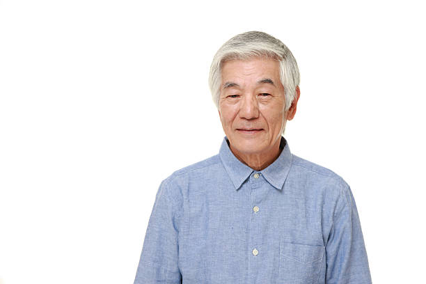 istock senior Japanese man smiles 483023842