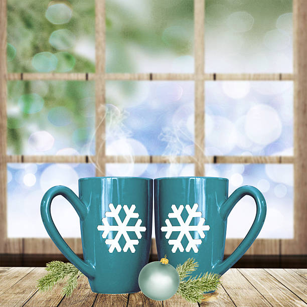 istock Christmas holiday mugs on wooden table 483024788