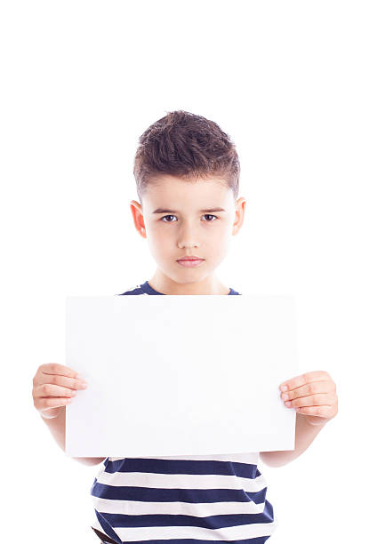 istock Boy with a blank sheet of paper 483031330