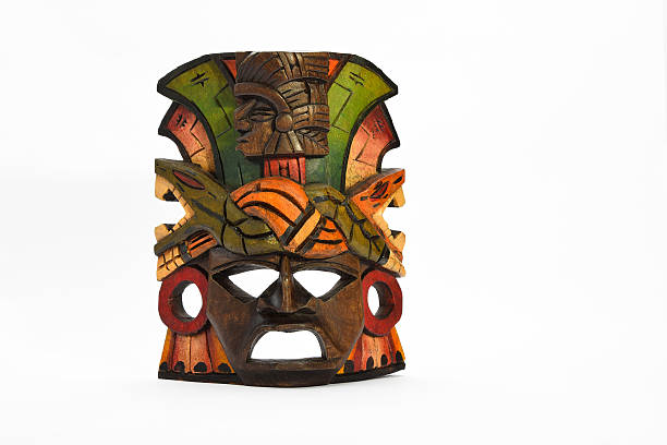istock Indian Mayan Aztec wooden mask isolated on white 483036892