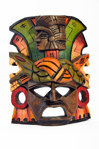 istock Indian Mayan Aztec wooden mask isolated on white 483036906
