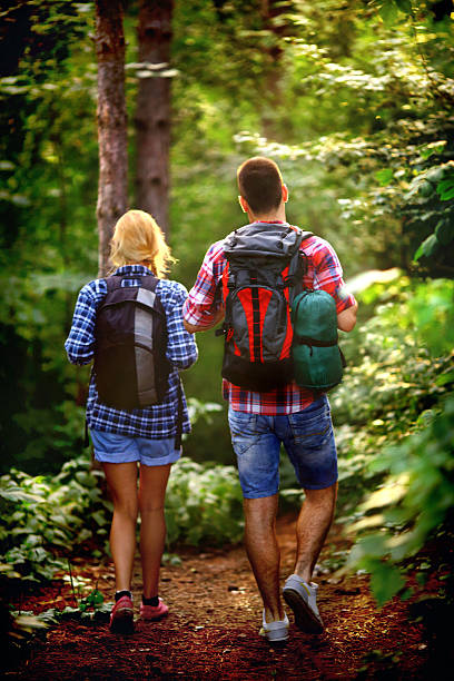 istock Couple hiking in a forest. 483036986