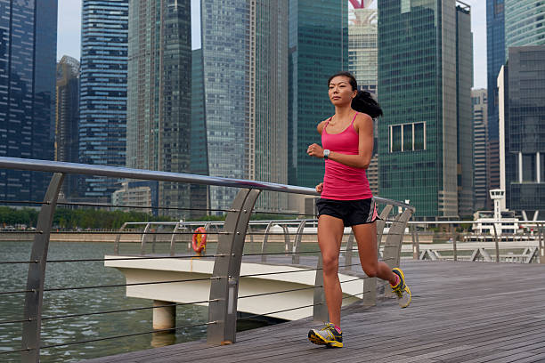 istock fitness woman running 483040524