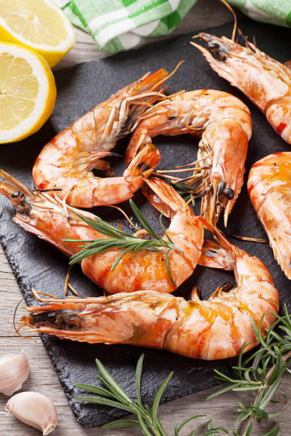 istock Grilled shrimps on stone plate 483040780