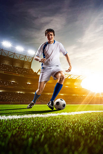 istock Soccer player in action panorama 483041280