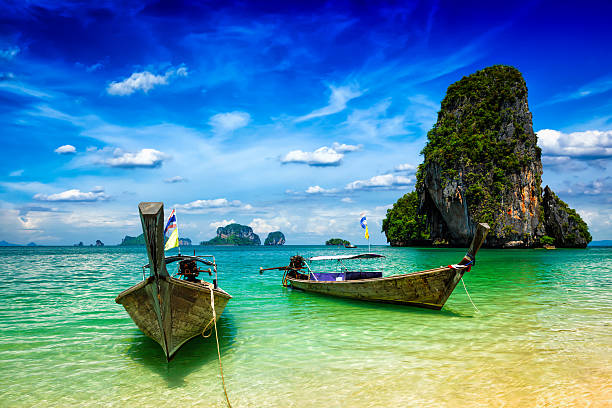 istock Long tail boats on beach, Thailand 483041310