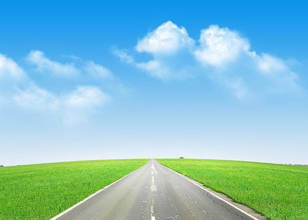 istock Asphalt road through the green field and blue sky 483041598