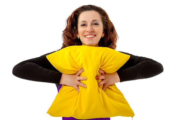 a woman with cushions on a white backgroundw