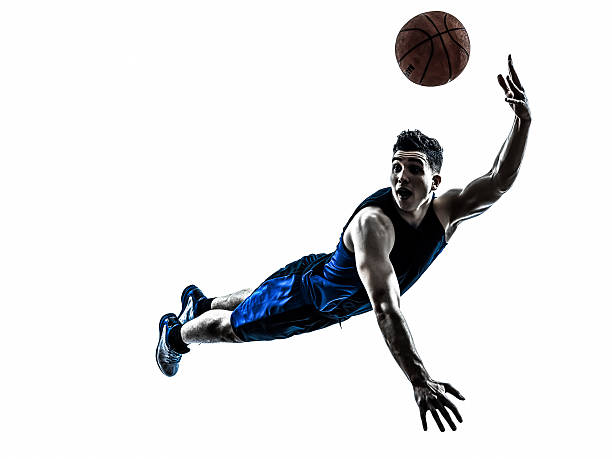 istock caucasian man basketball player jumping throwing silhouette 483044439