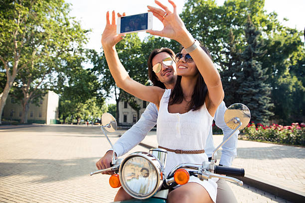 istock Happy couple making selfie photo on smartphone 483045340