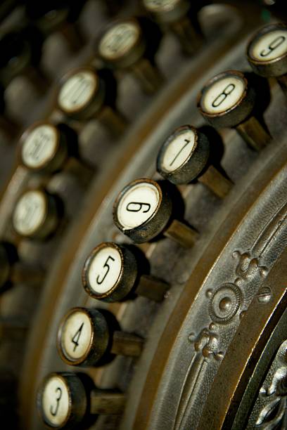 istock Twisted key on old German cash register 483047613