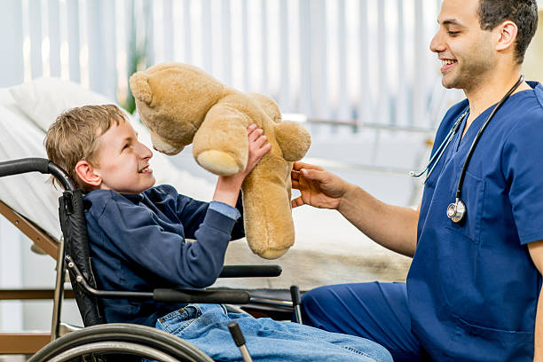 Developmental Disability Boy 180+ Developmental Pediatrics Stock Photos, Pictures & Royalty-Free ...