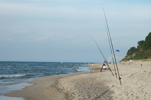 wędki w sandy beach - rewal zdjęcia i obrazy z banku zdjęć