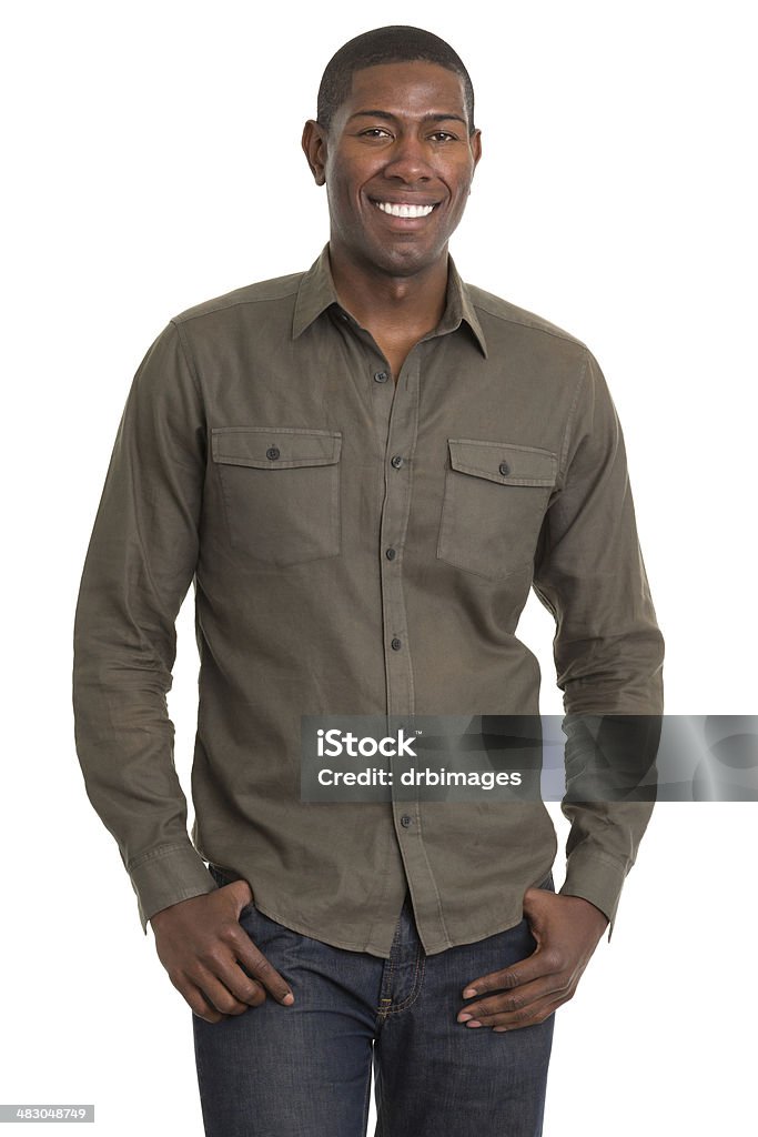 Uomo sorridente in piedi - Foto stock royalty-free di Bianco