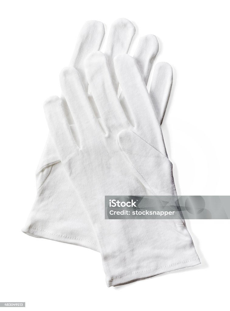 Cotton gloves Pair of white protective  cotton gloves isolated on white with natural shadow. Protective Glove Stock Photo