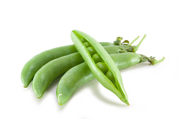 istock fresh green pea in the pod isolated 483051749
